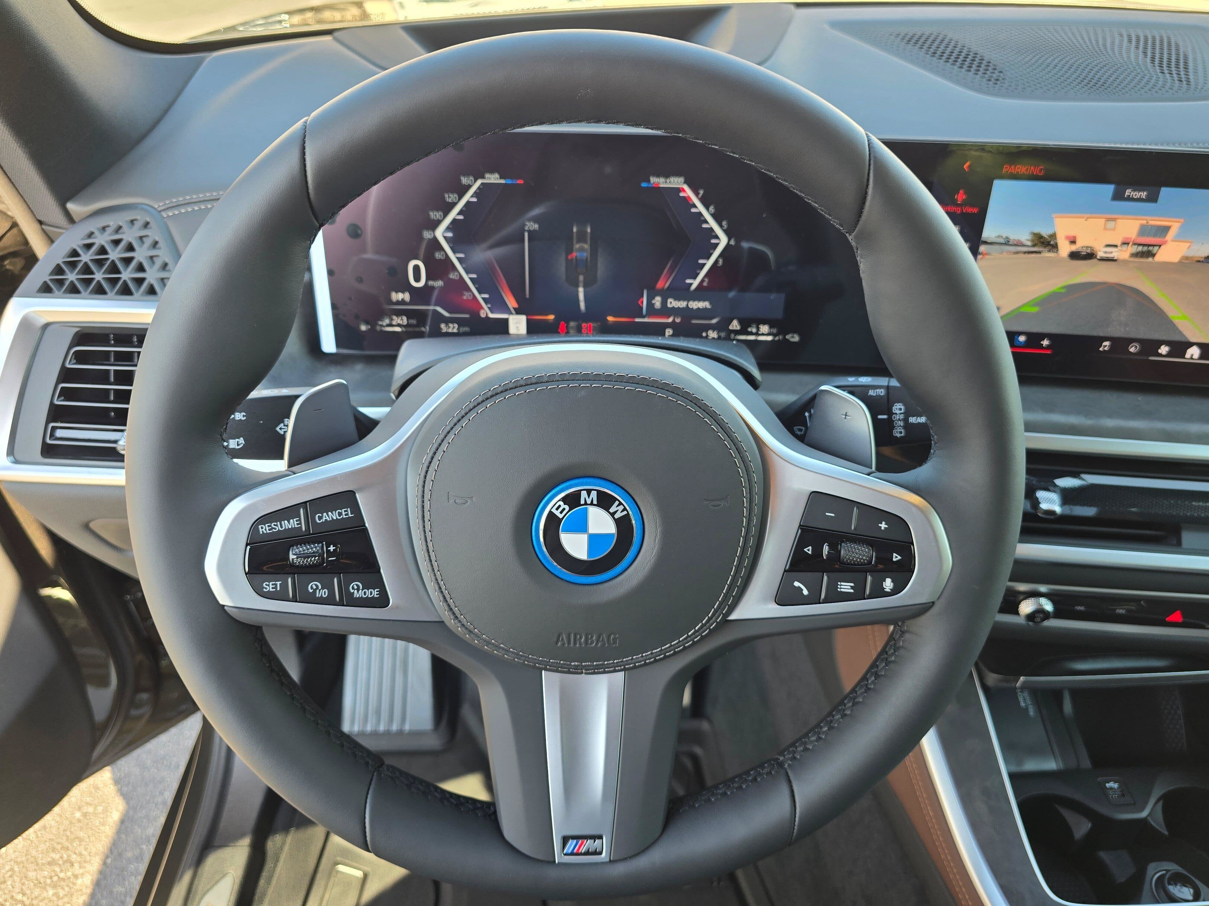 New 2026 Manhattan Green Metallic BMW xDrive50e image 16