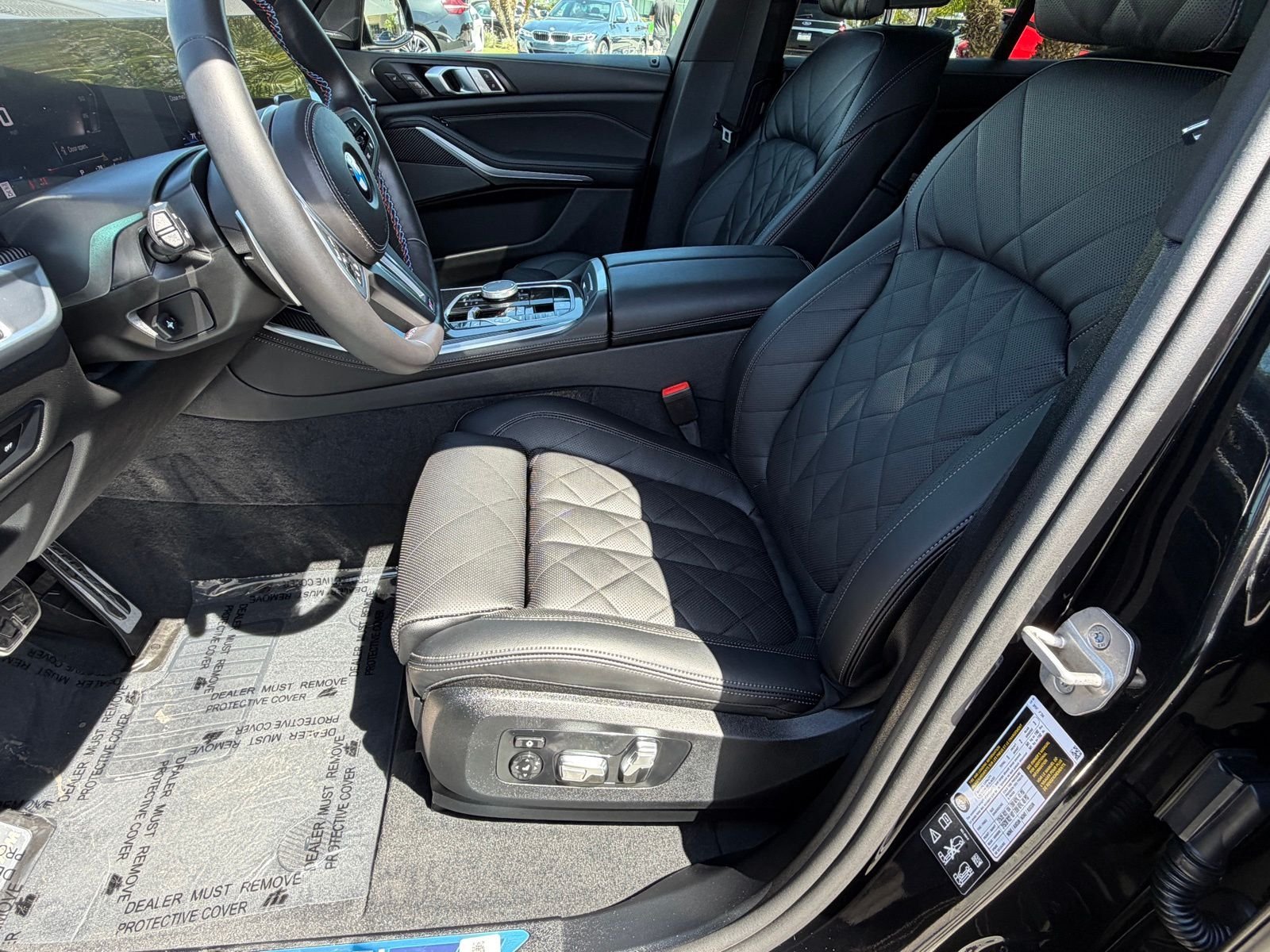 Used 2026 Black Sapphire Metallic BMW M60i image 23