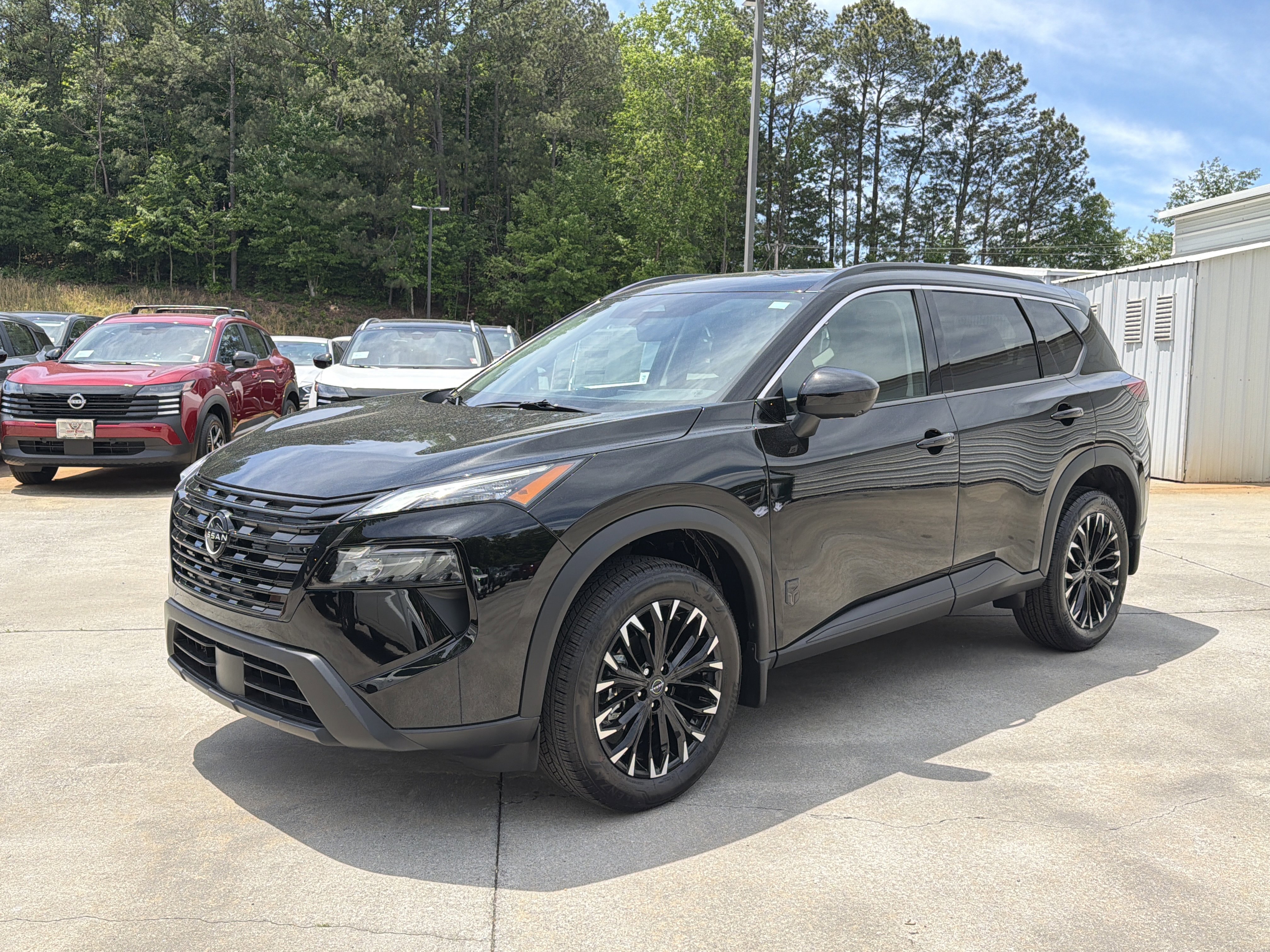New 2026 Super Black Nissan Dark Armor image 4