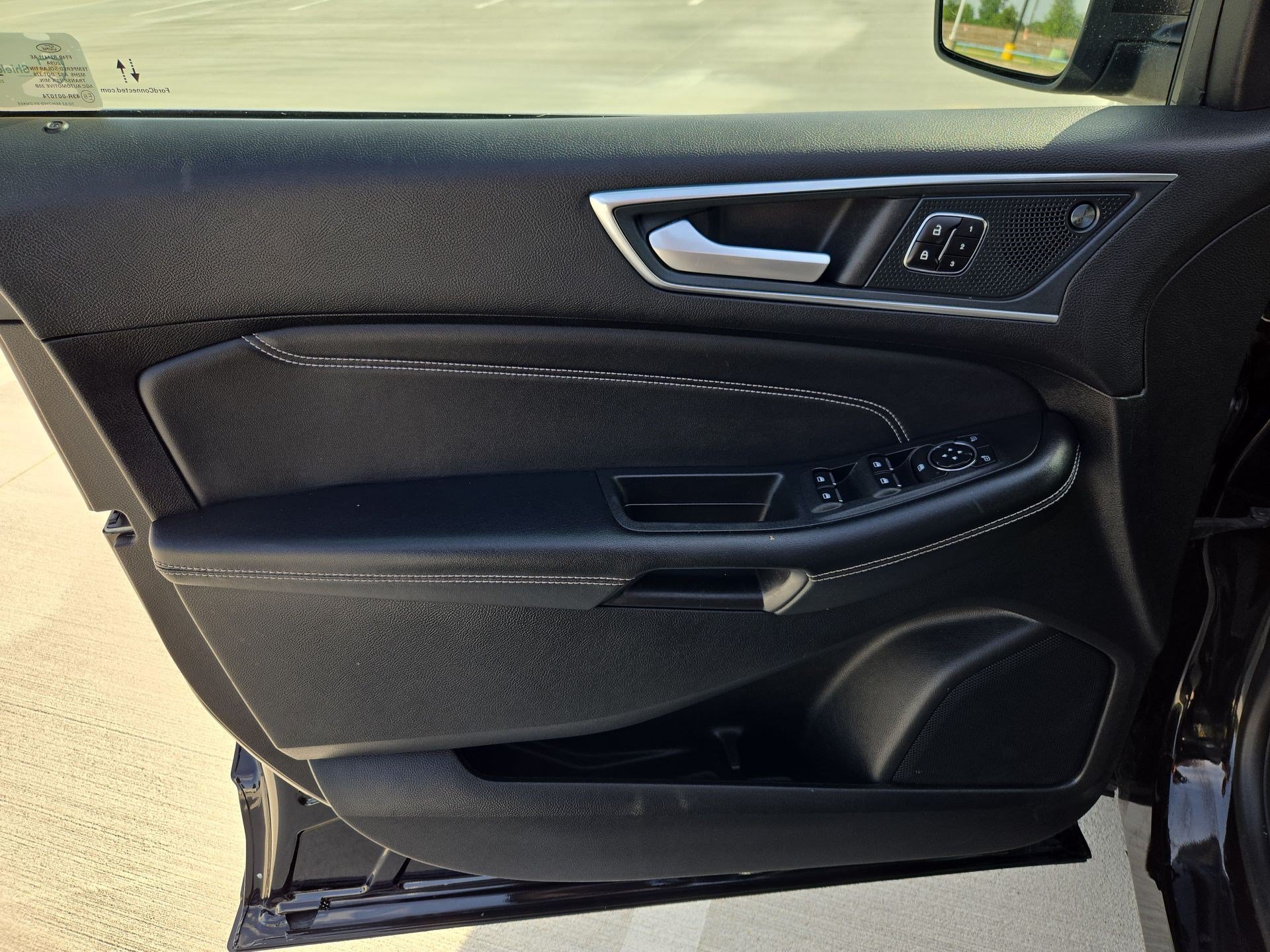 Used 2024 Black Metallic Ford Titanium image 12