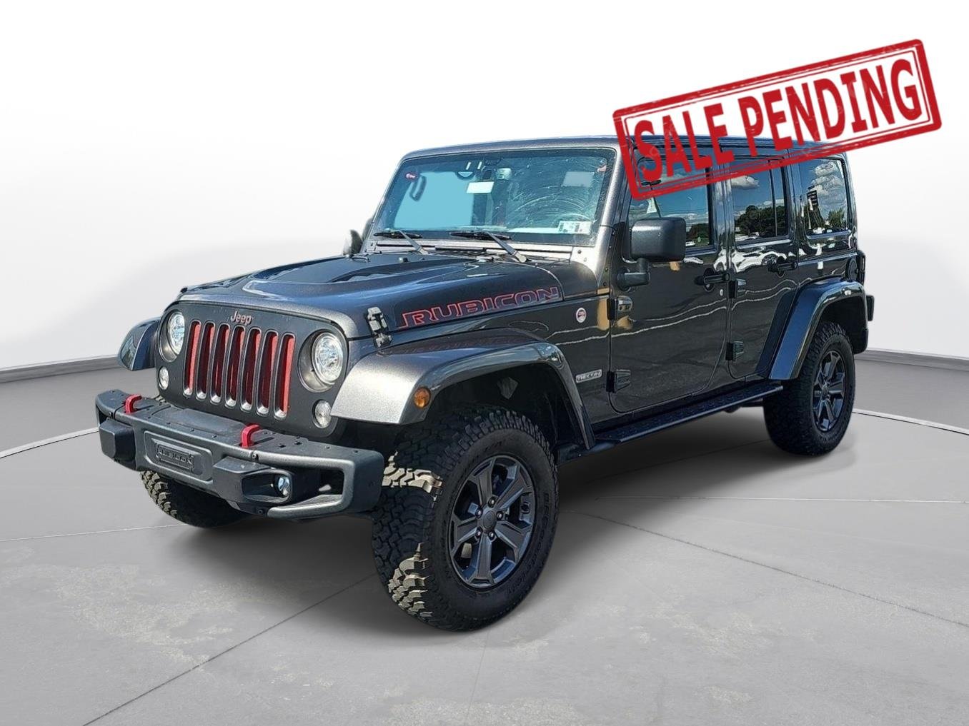 Used 2017 Granite Crystal Metallic Clearcoat Jeep Rubicon Recon image 1