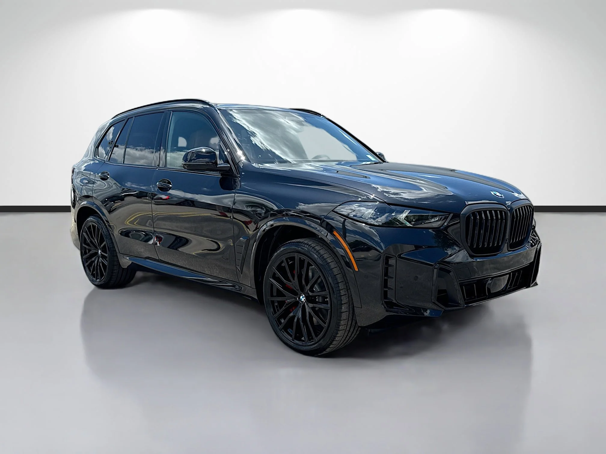 New 2026 Black Sapphire Metallic BMW sDrive40i image 1