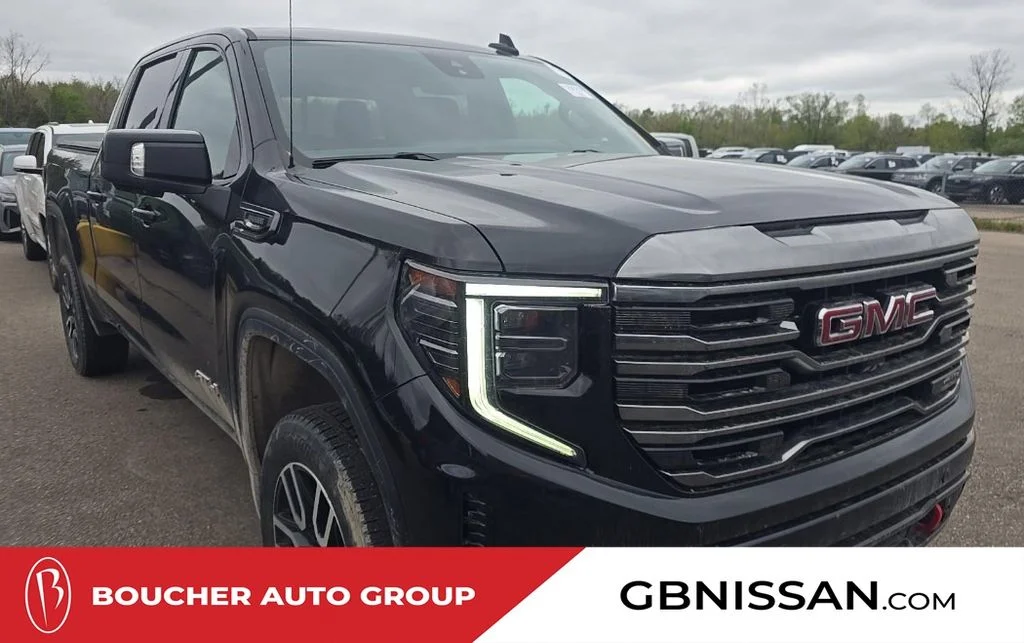 Used 2023 Black Metallic GMC AT4 image 1