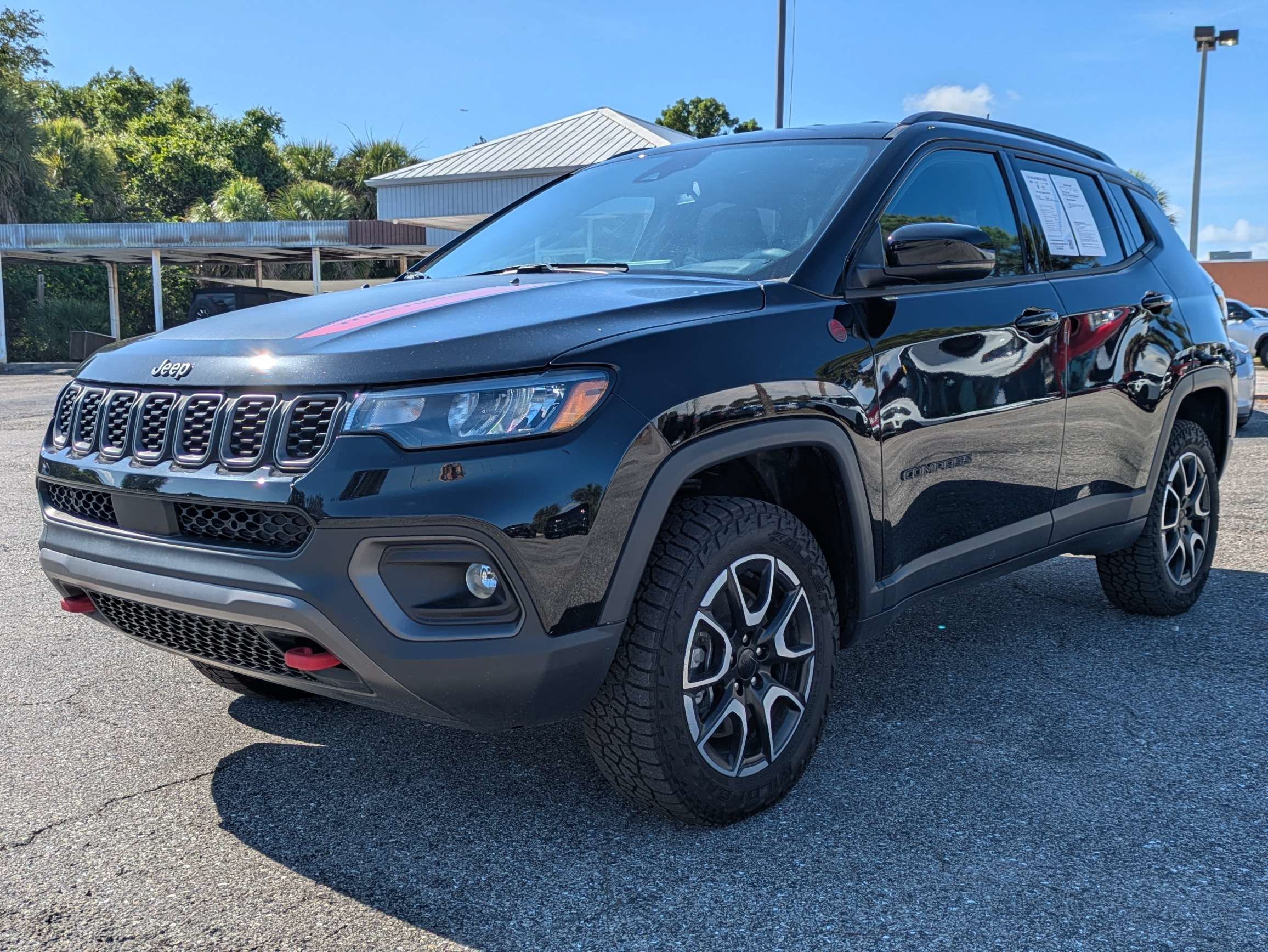Used 2024 Diamond Black Crystal Pearlcoat Jeep Trailhawk image 9