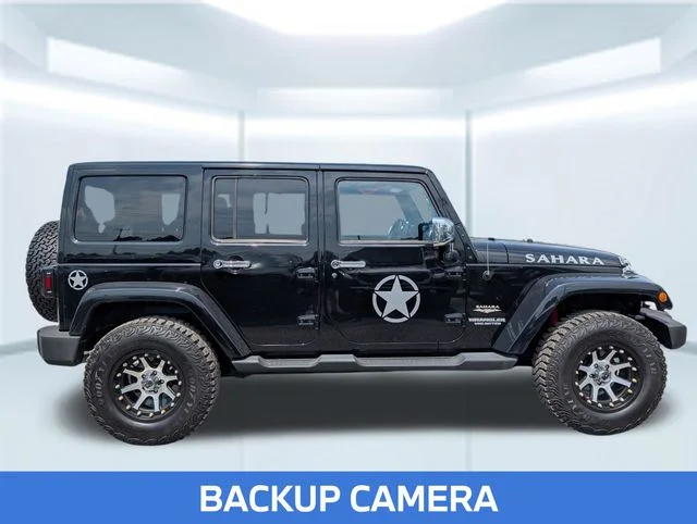 Used 2013 Black Jeep Unlimited Sahara image 7