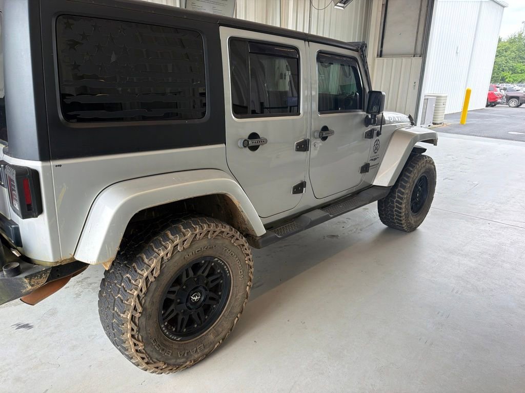 Used 2012 Bright Silver Metallic Clearcoat Jeep Sahara image 6