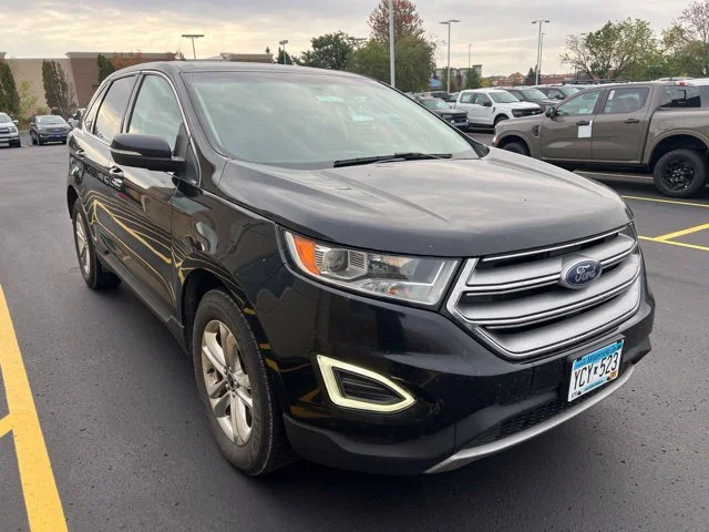 Used 2016 Black Ford SEL image 1