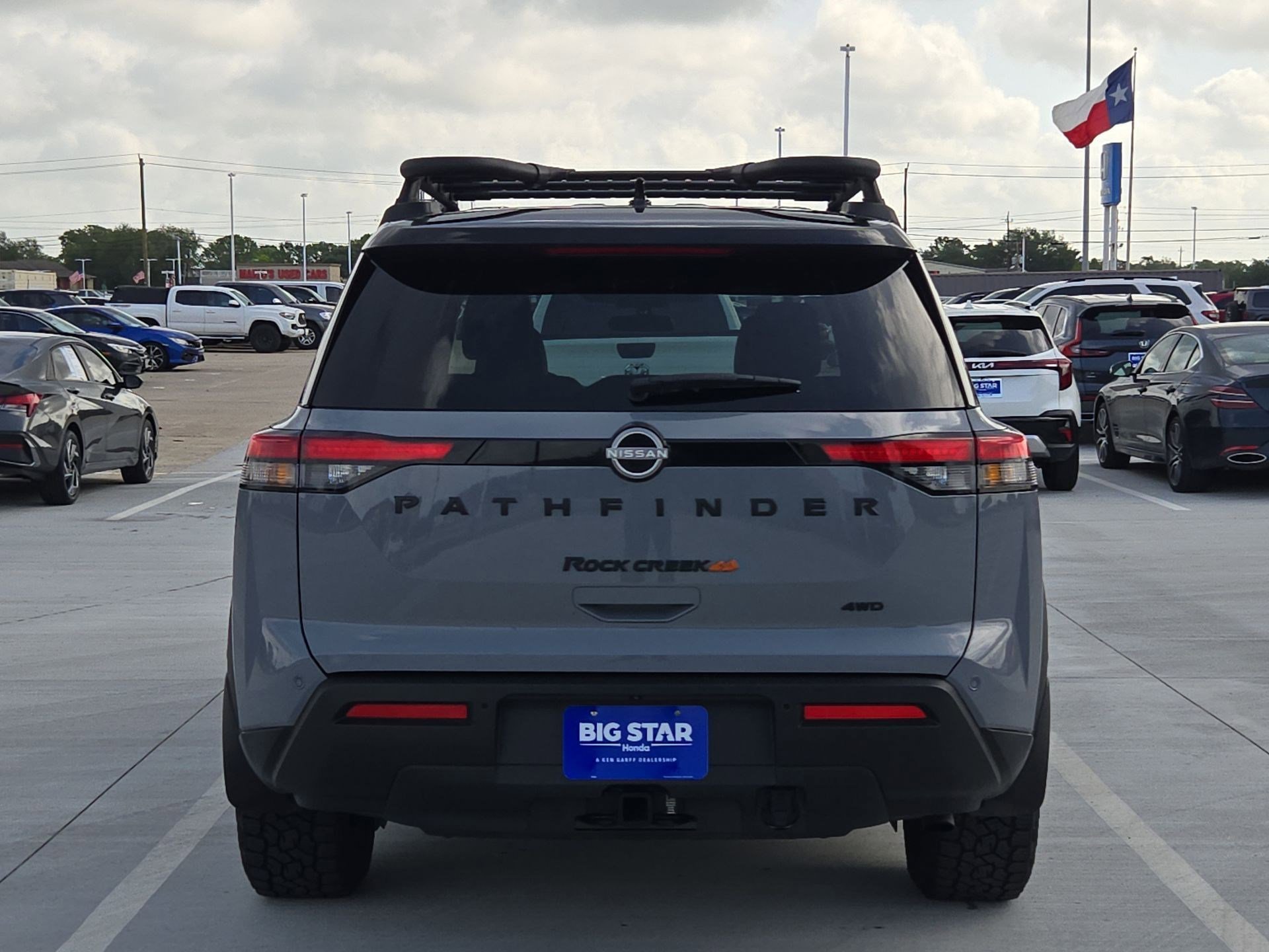 Used 2025 Solid Gray/Super Black Nissan Rock Creek image 4