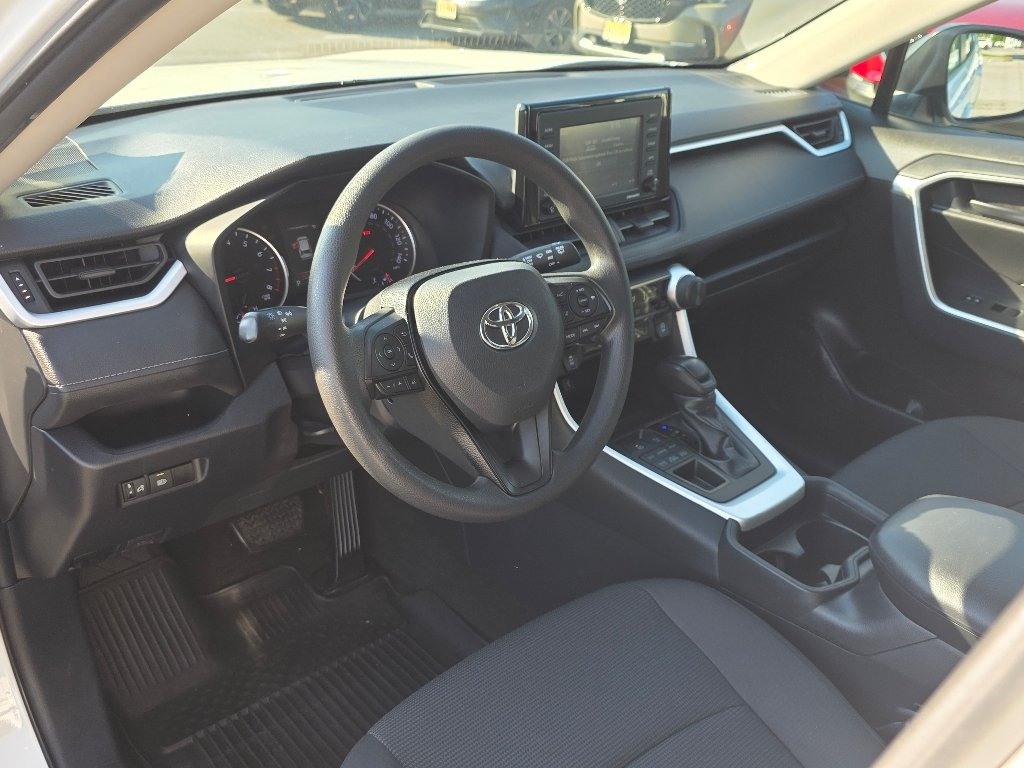 Used 2021 Super White Toyota LE image 26