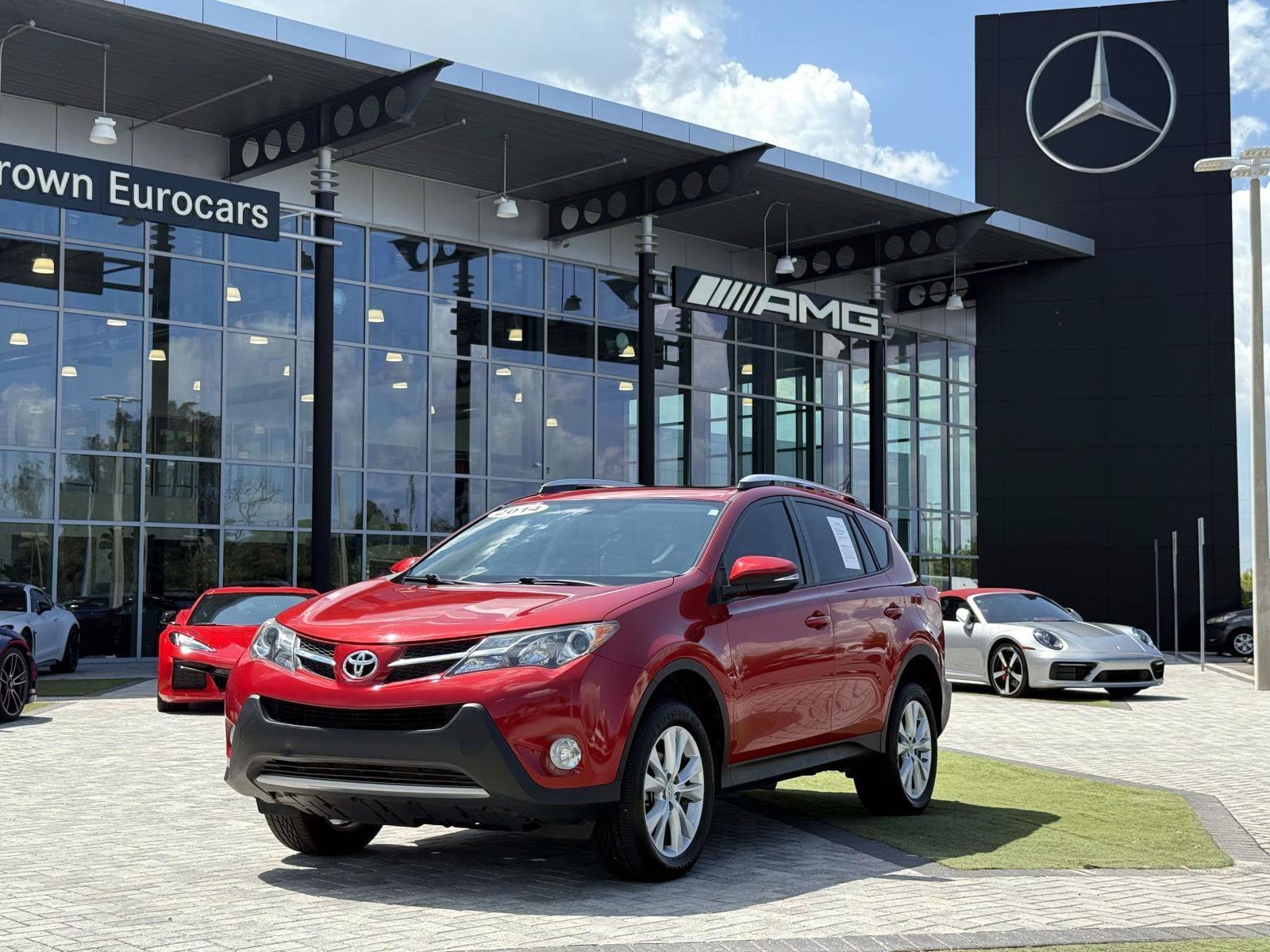 Used 2014 Barcelona Red Metallic Toyota Limited image 1
