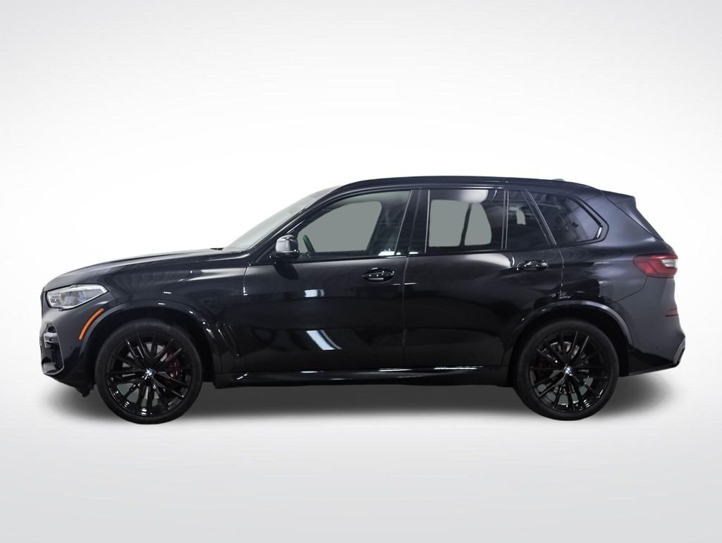 Used 2022 Black Sapphire Metallic BMW M50i image 2