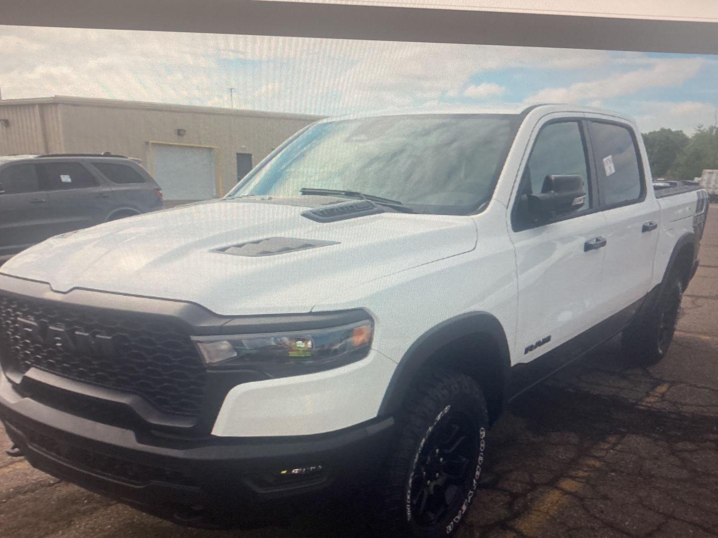 Used 2025 Bright White Clearcoat Ram Rebel image 4