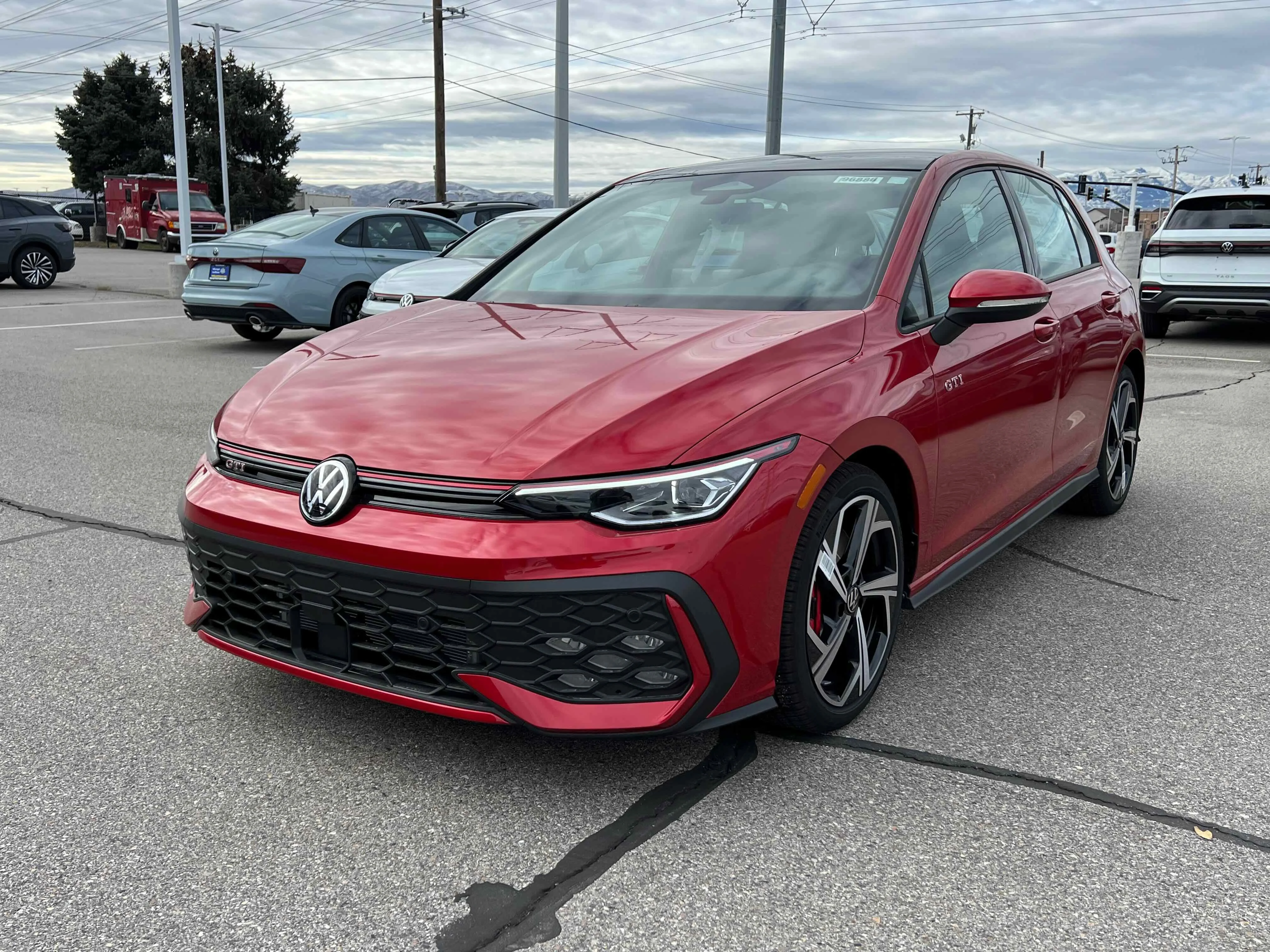 New 2026 Red Volkswagen SE image 1