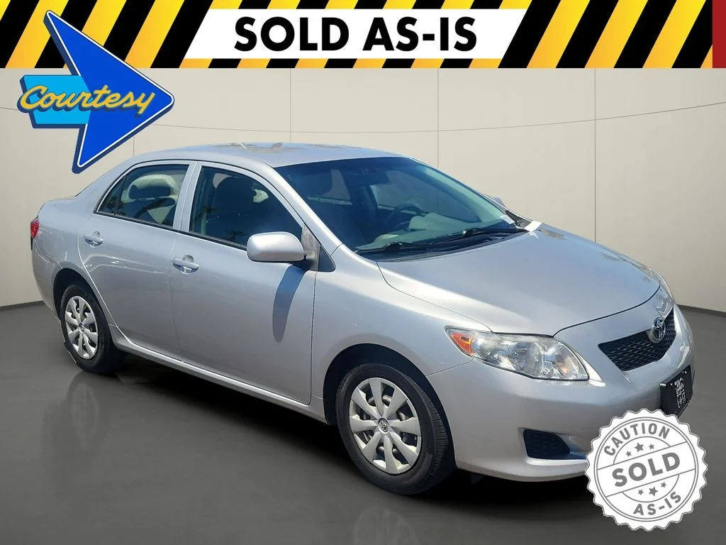 Used 2010 Classic Silver Metallic Toyota LE image 1