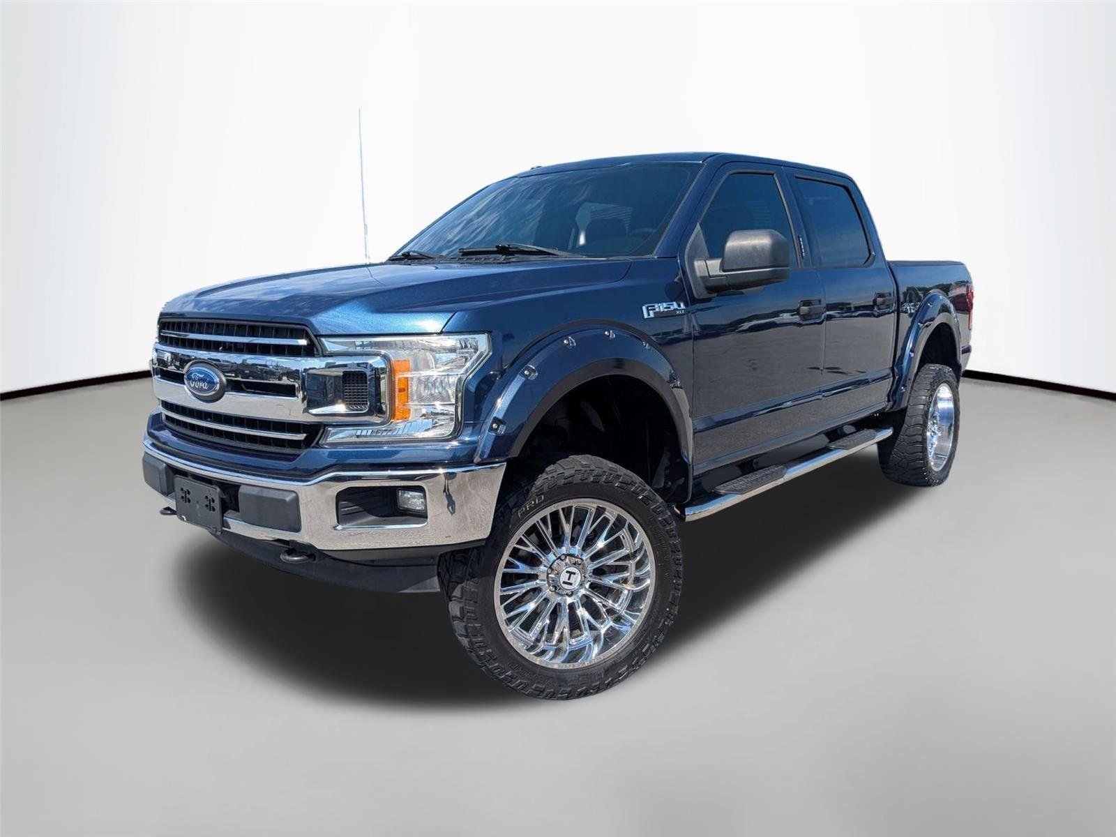 Used 2018 Blue Jeans Metallic Ford XLT image 1