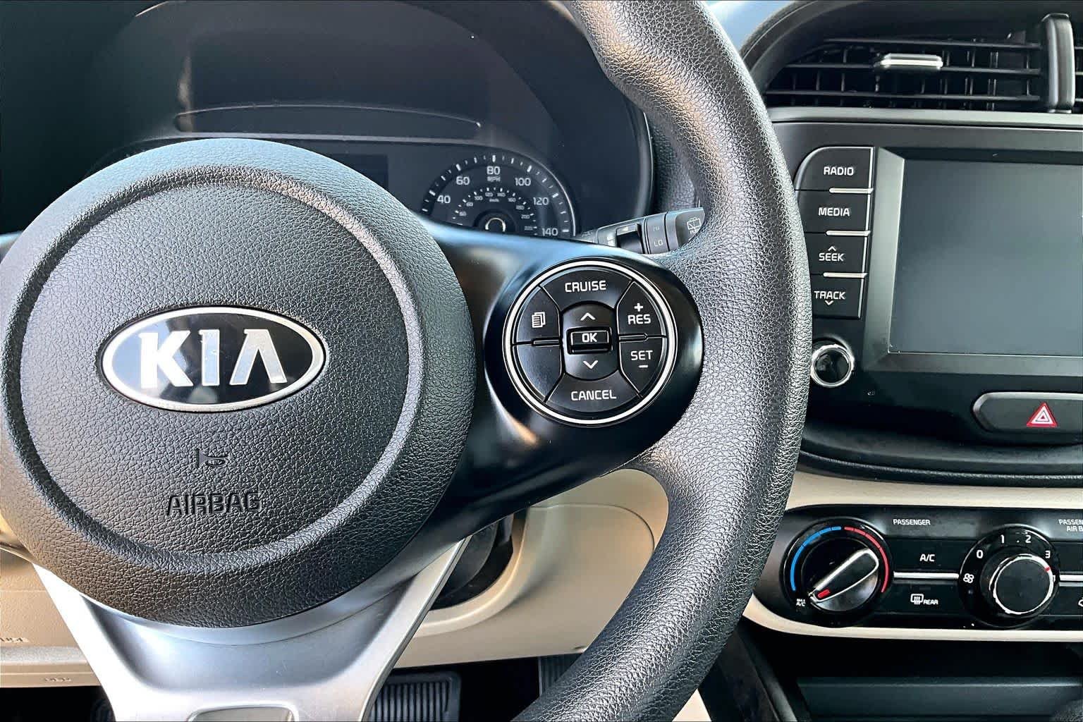 Used 2020 Cherry Black Kia LX image 25