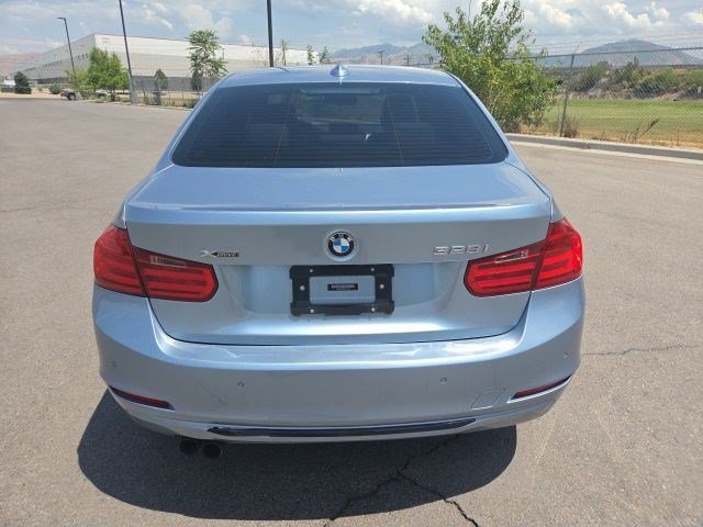 Used 2013 Liquid Blue Metallic BMW 328i xDrive image 4
