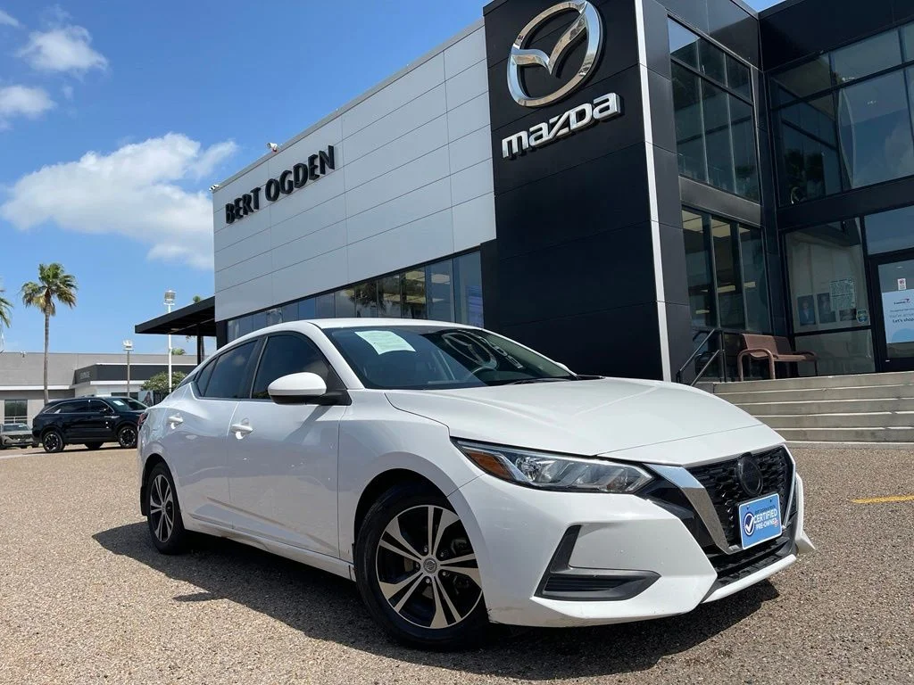 Used 2021 White Nissan S image 1
