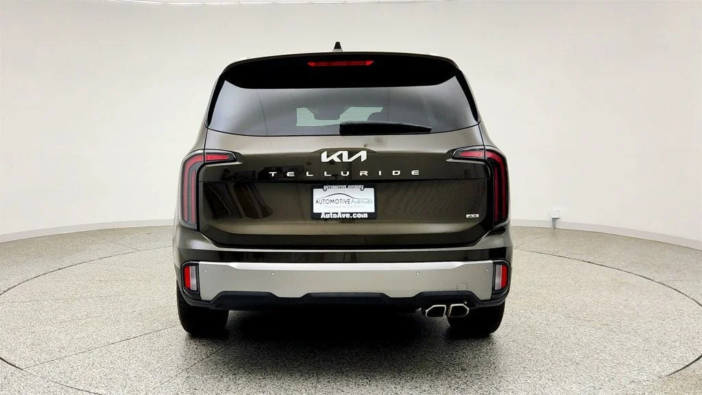 Used 2025 Dark Moss Kia SX AWD w/ Captain