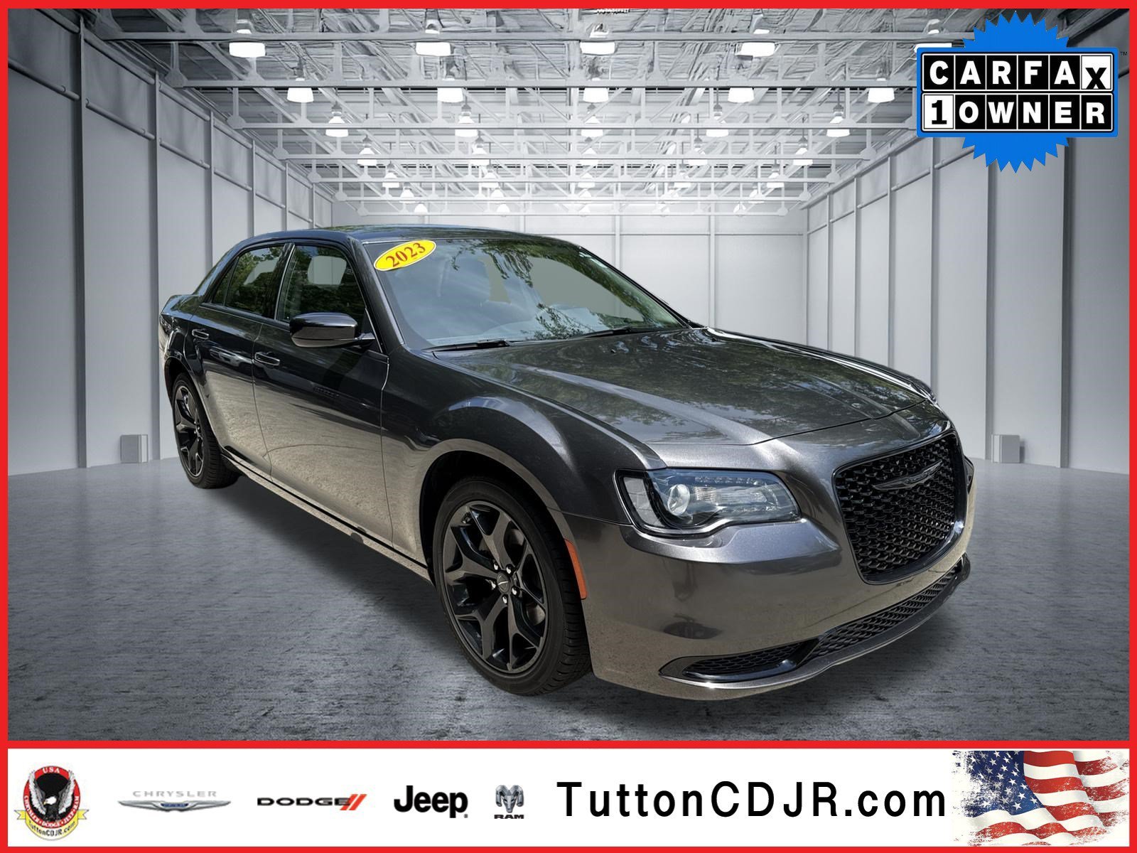 Used 2023 Granite Crystal Metallic Clearcoat Chrysler Touring image 1