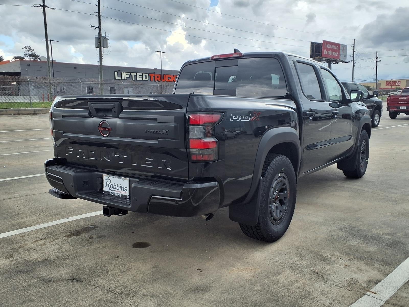 New 2026 Super Black Nissan Crew Cab PRO-X® image 5