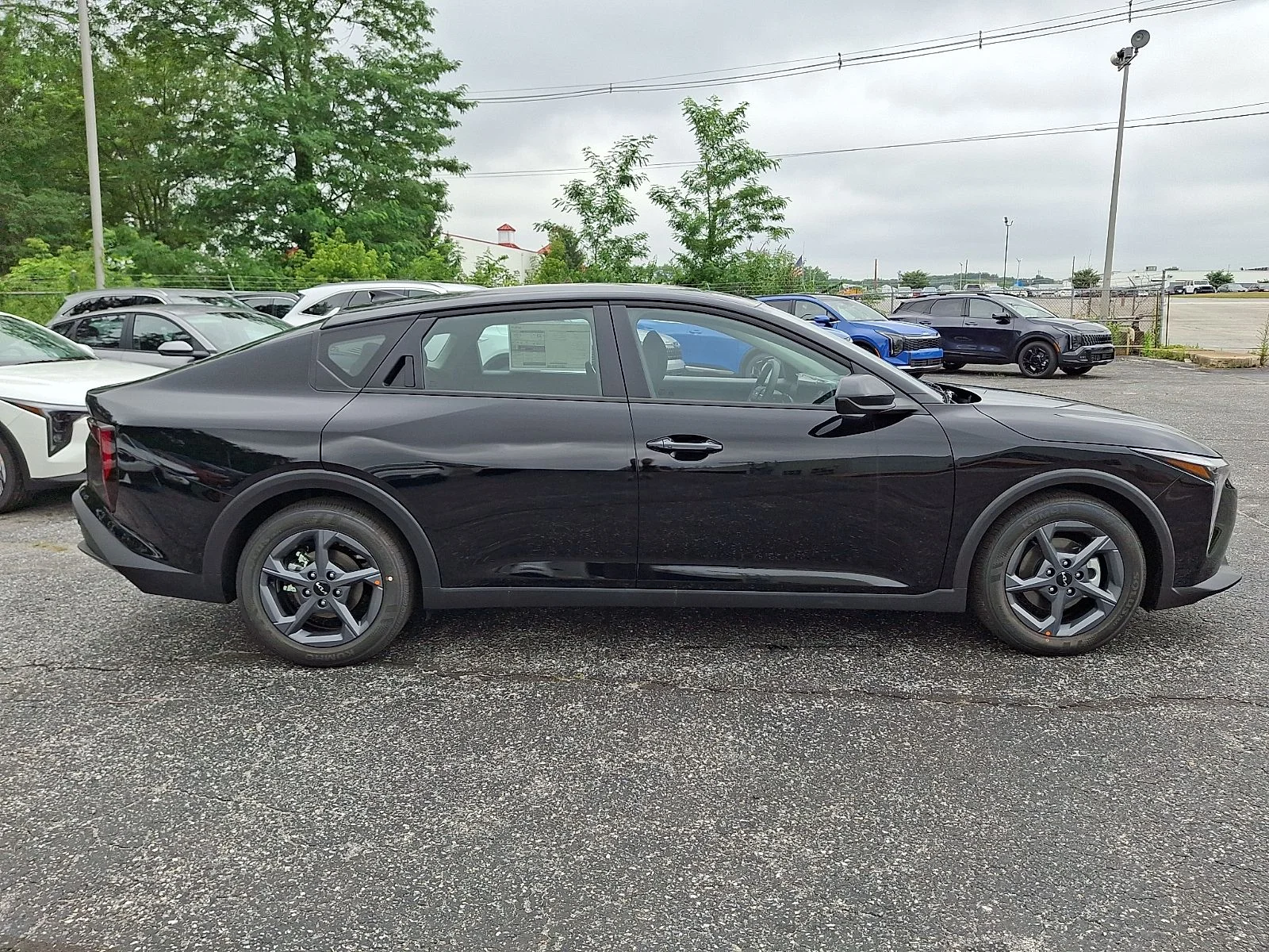 New 2026 Black Kia LXS image 9