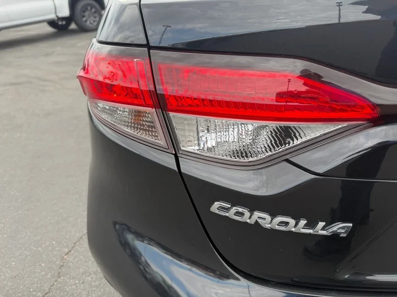 Used 2022 Black Sand Pearl Toyota LE image 24