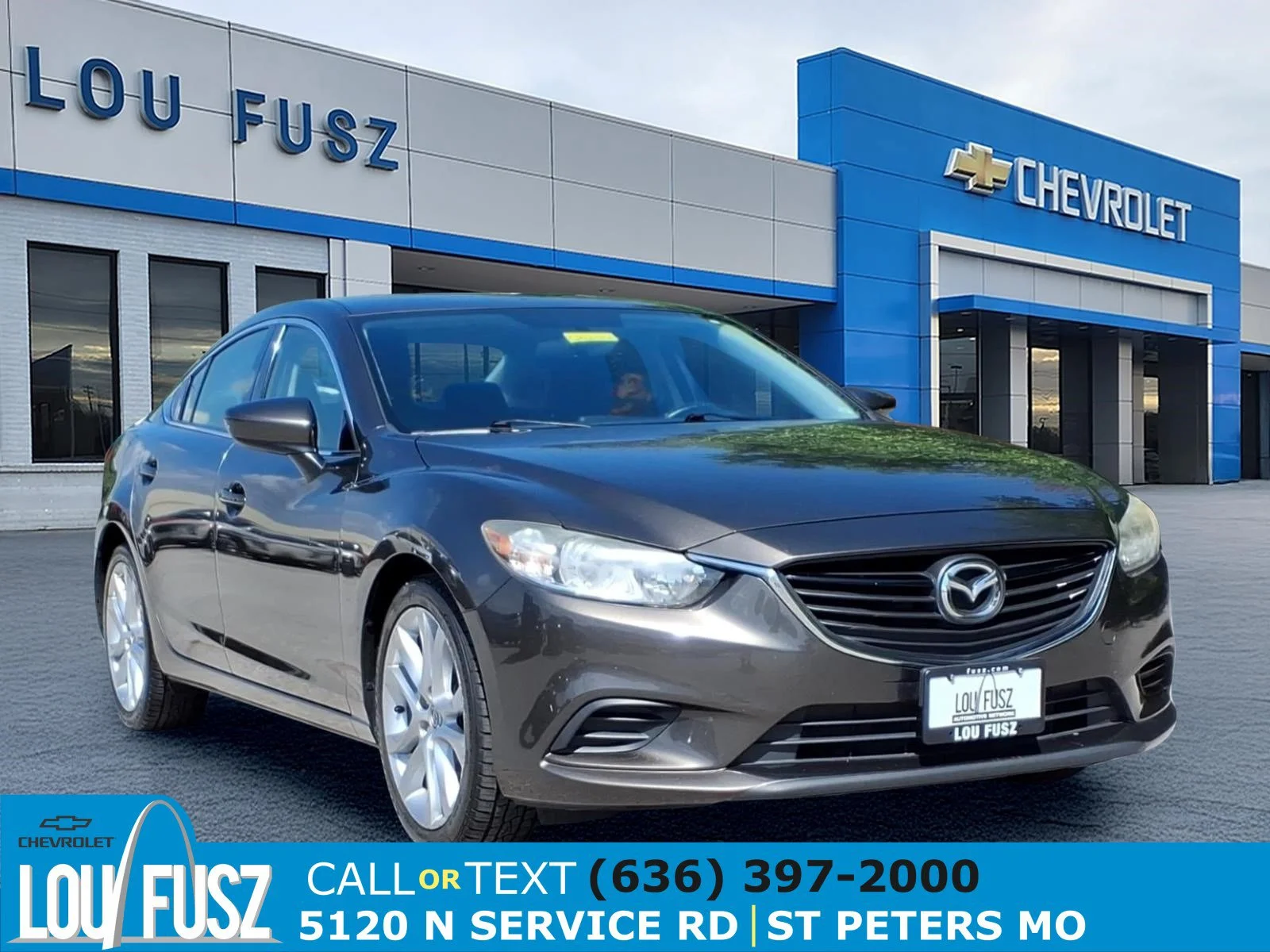 Used 2016 Titanium Flash Mica Mazda i Touring image 1