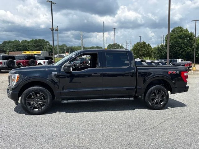 Used 2022 Agate Black Metallic Ford Lariat image 5