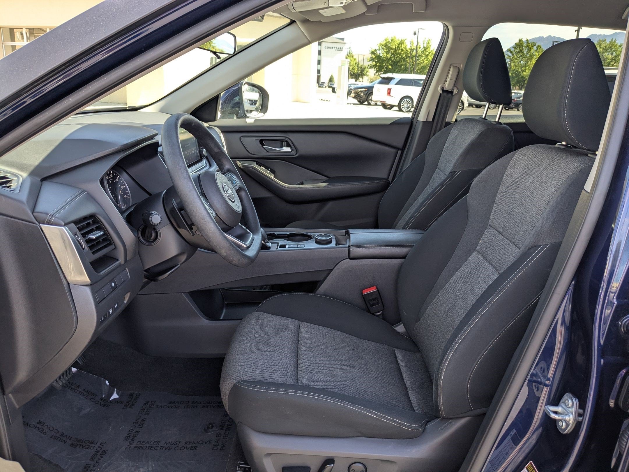 Used 2024 Deep Ocean Blue Pearl Nissan SV image 16