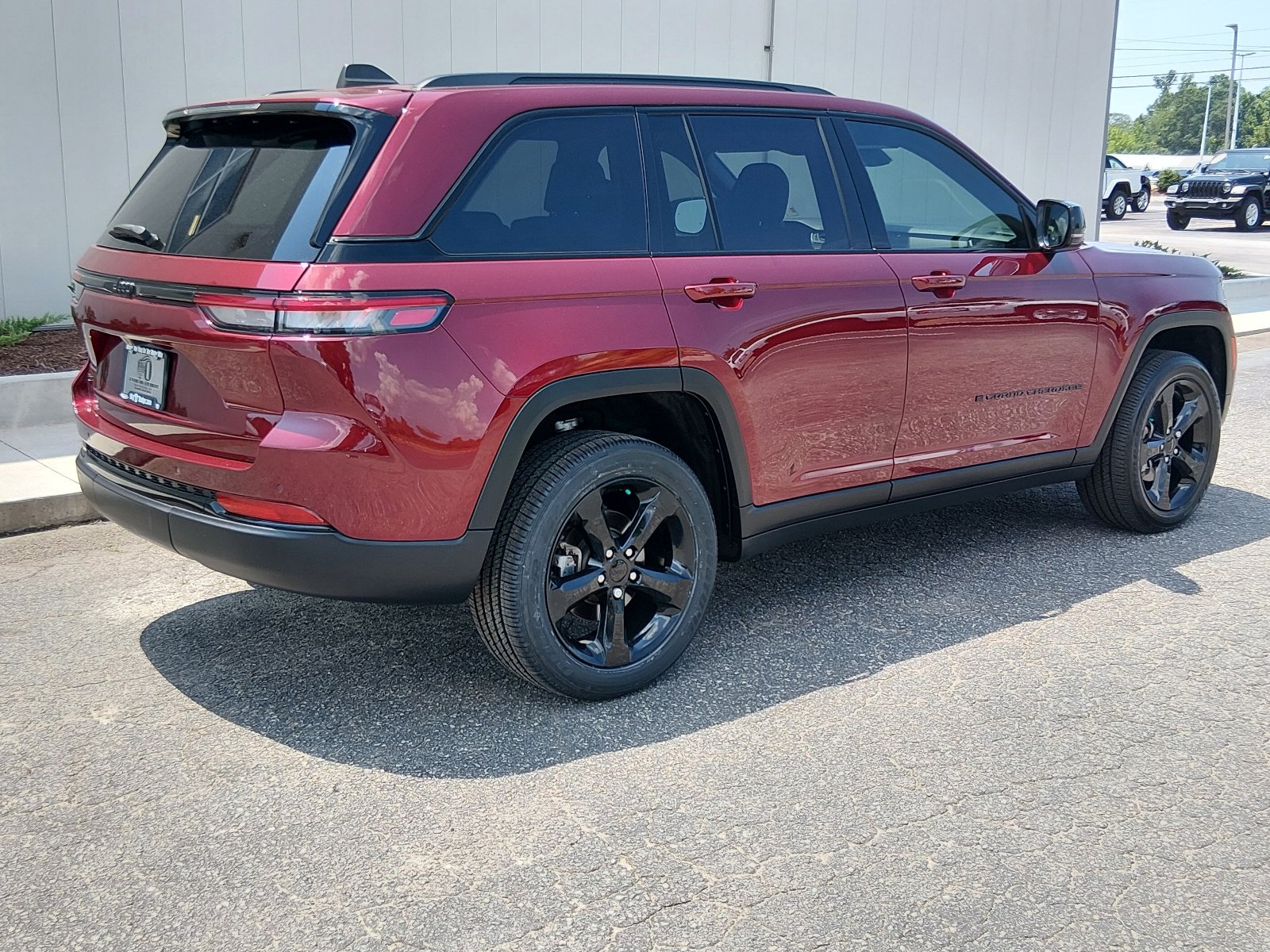 Certified Used 2024 BURGUNDY Jeep Laredo image 3
