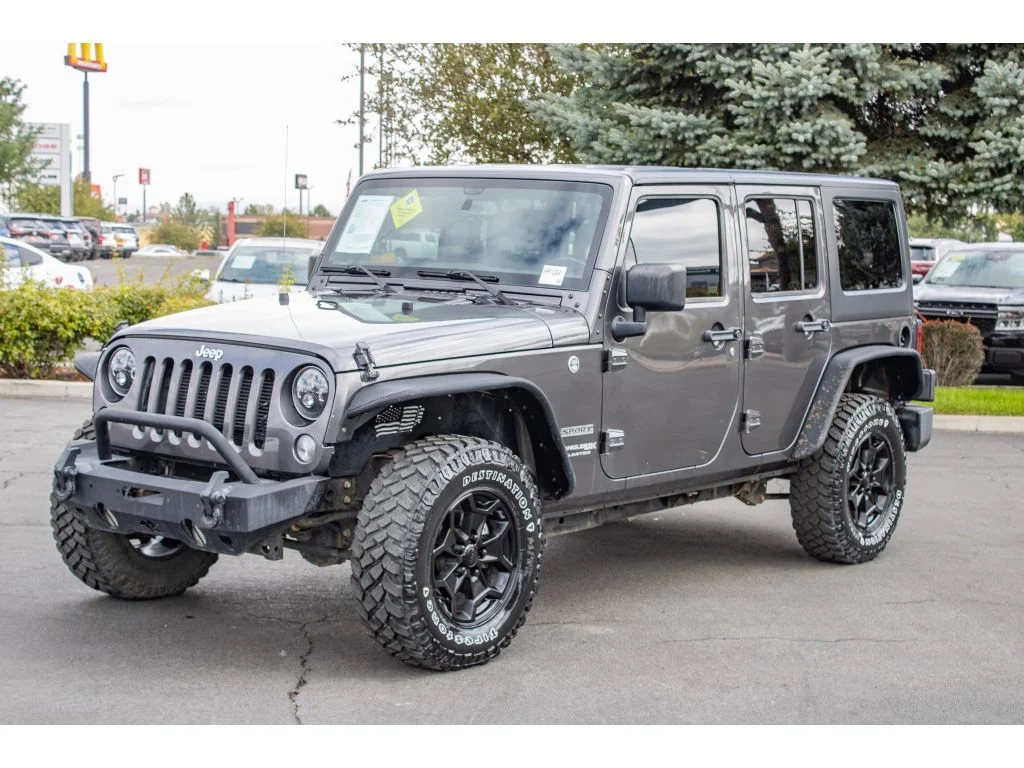Used 2018 Granite Crystal Metallic Clearcoat Jeep Sport S image 4