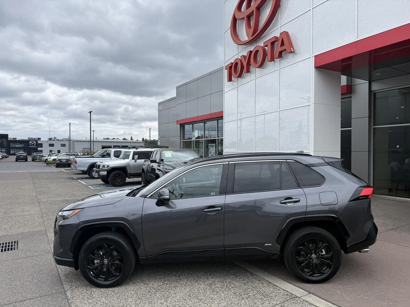 Used 2023 Magnetic Gray Metallic Toyota Hybrid SE image 5