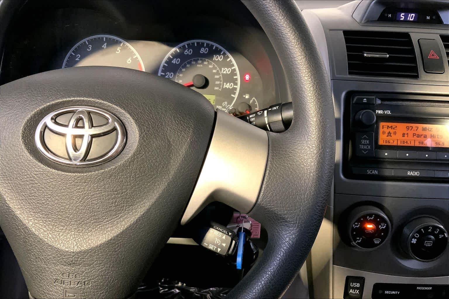 Used 2012 Black Sand Pearl Toyota LE image 24