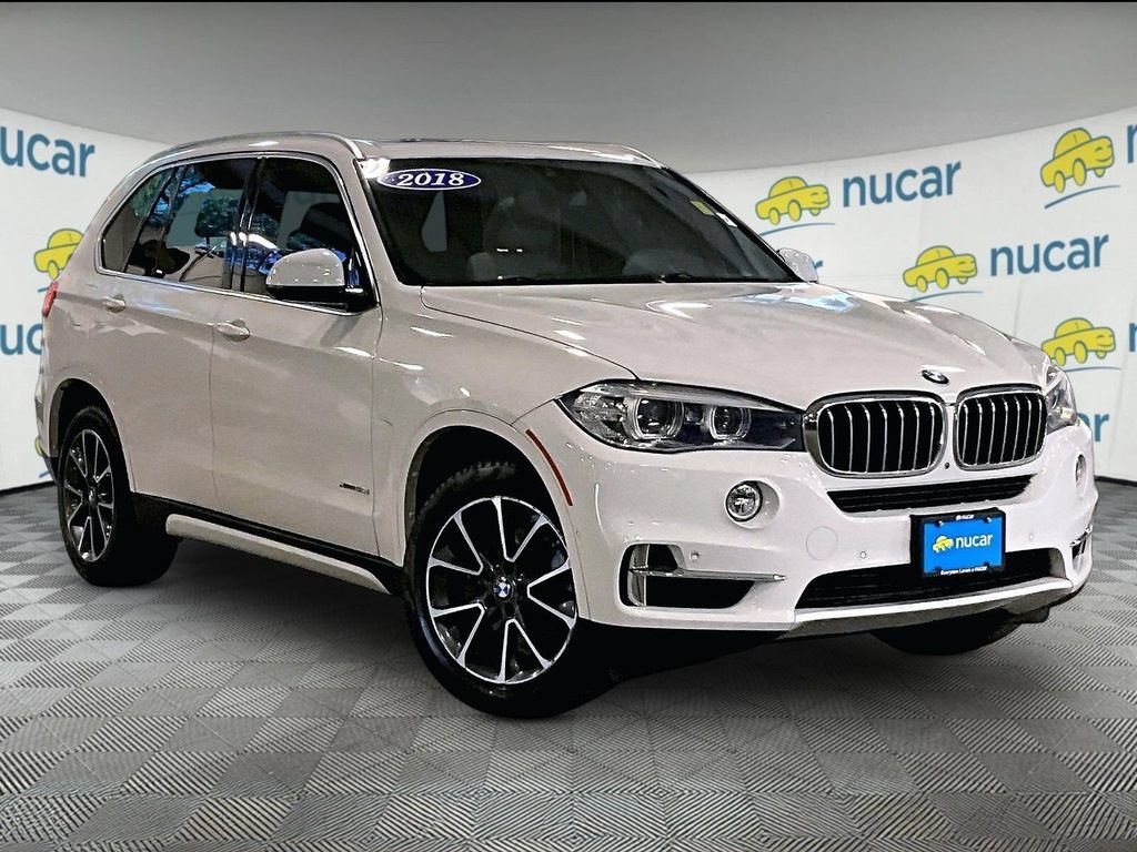 Used 2018 White BMW xDrive35i image 1