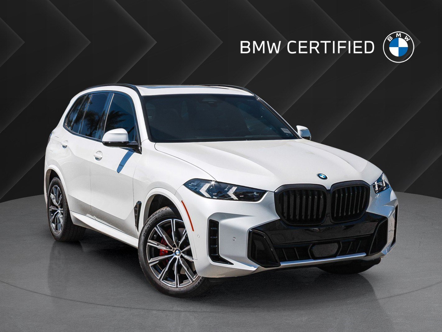 Used 2024 Mineral White Metallic BMW xDrive40i image 1