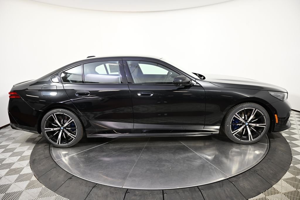 New 2027 Black Sapphire Metallic BMW 550e xDrive image 6