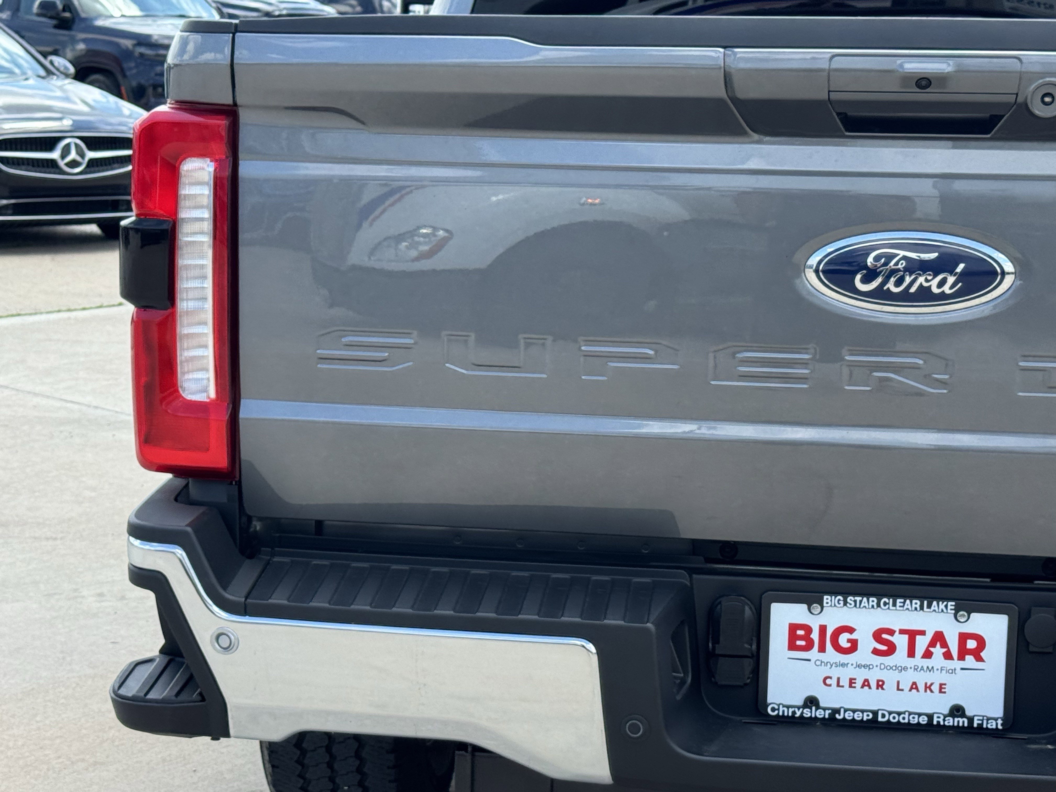 Used 2025 Gray Metallic Ford LARIAT 4WD Crew Cab 6.75