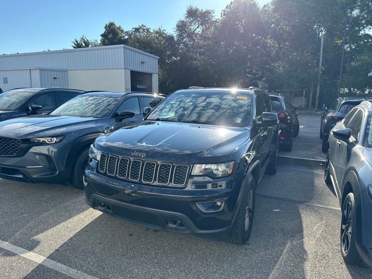 Used 2016 Black Jeep Laredo image 1