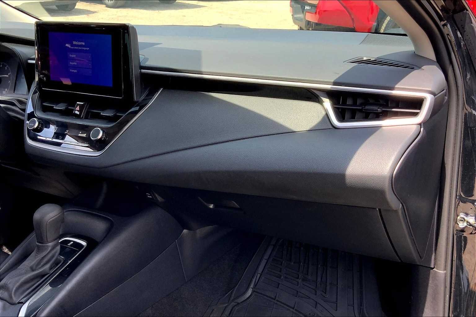 Used 2023 Midnight Black Metallic Toyota LE image 18