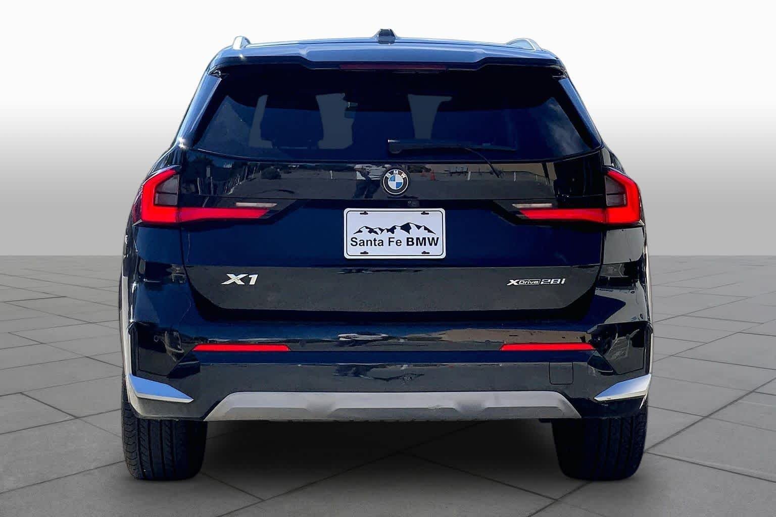 Used 2023 Black Sapphire Metallic BMW xDrive28i image 4