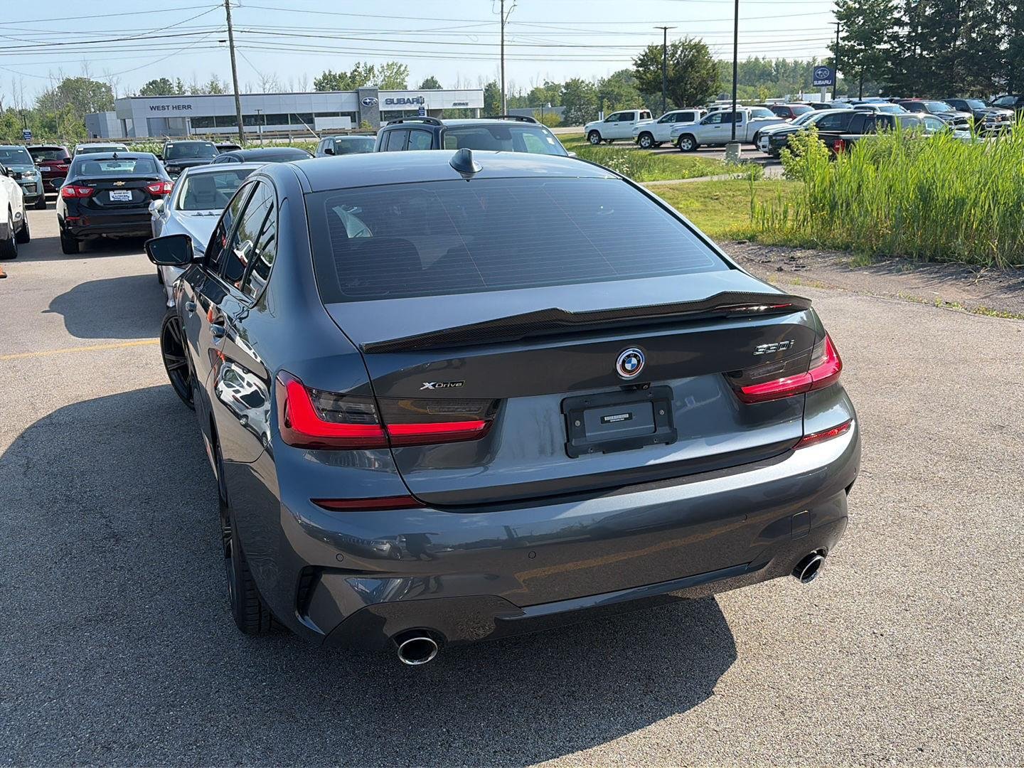 Used 2022 Mineral Grey Metallic BMW 330i xDrive image 3
