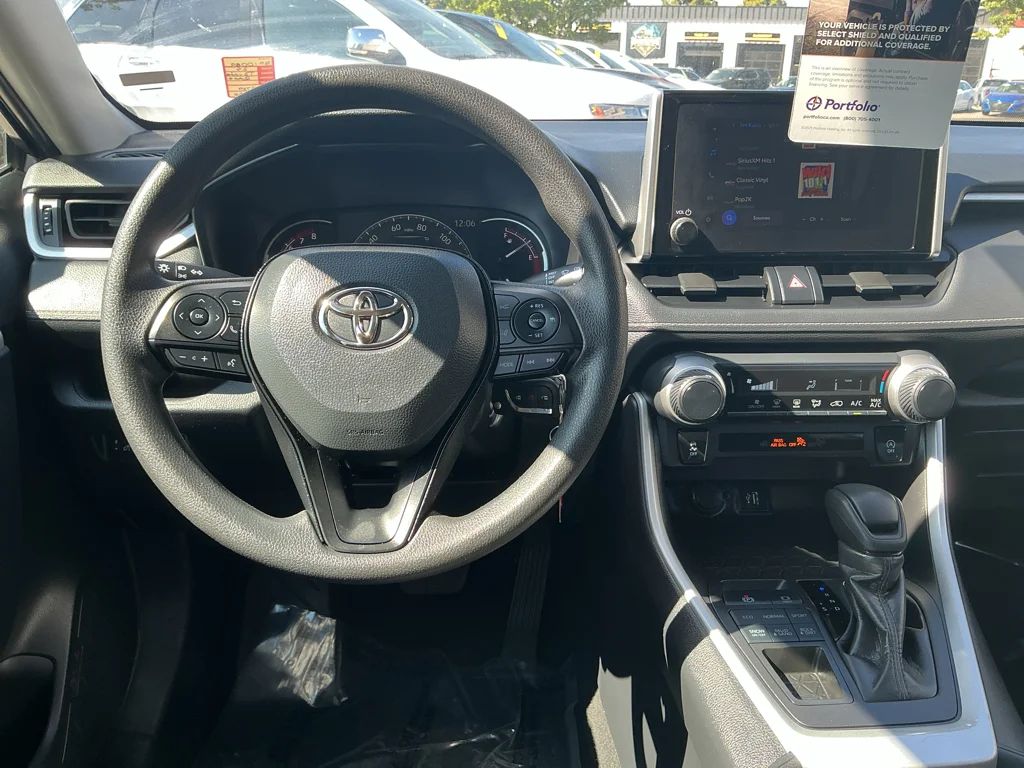 Used 2025 Magnetic Gray Metallic Toyota LE image 9
