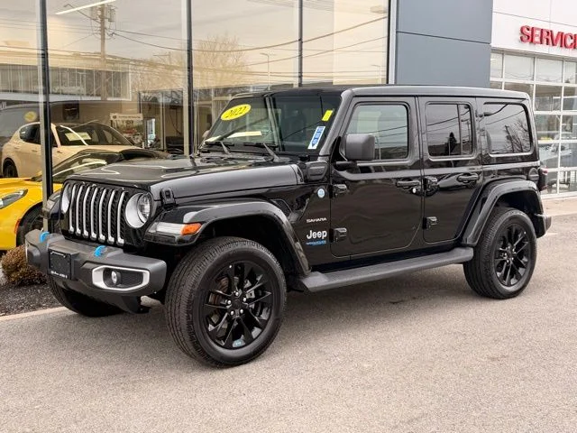 Used 2022 Black Jeep Unlimited Sahara 4xe image 1