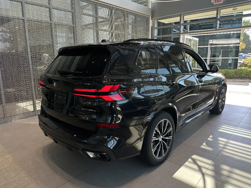New 2026 Black Sapphire Metallic BMW xDrive50e image 6