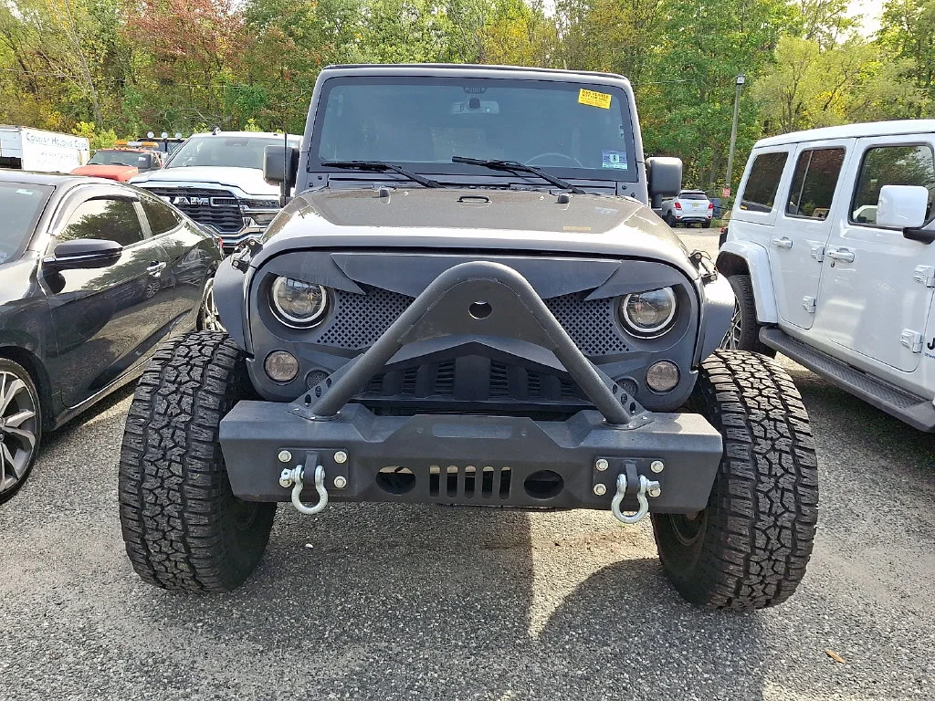 Used 2017 Gray Jeep Unlimited Sport image 2