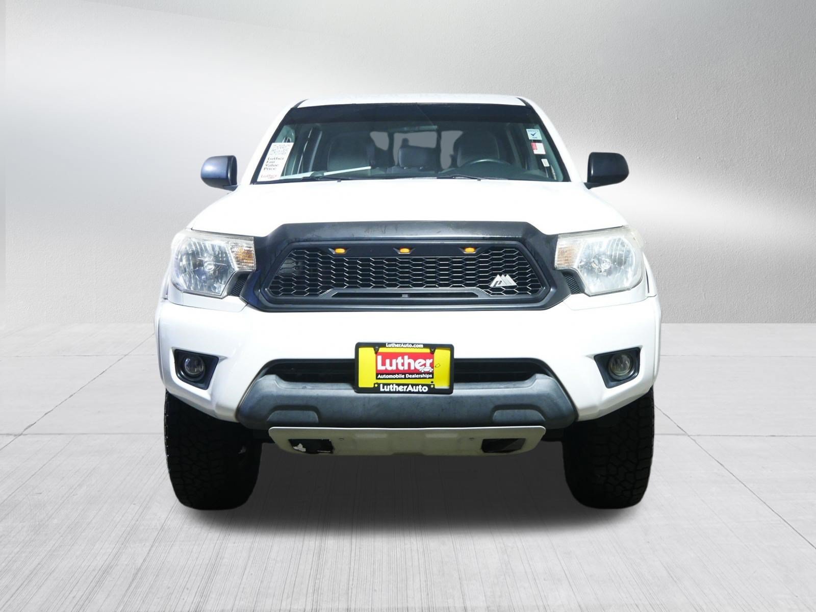 Used 2014 Toyota Tacoma Base with VIN 3TMLU4EN0EM159716 for sale in Brooklyn Center, MN