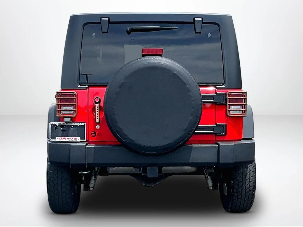 Used 2015 Red Jeep Unlimited Sport image 4