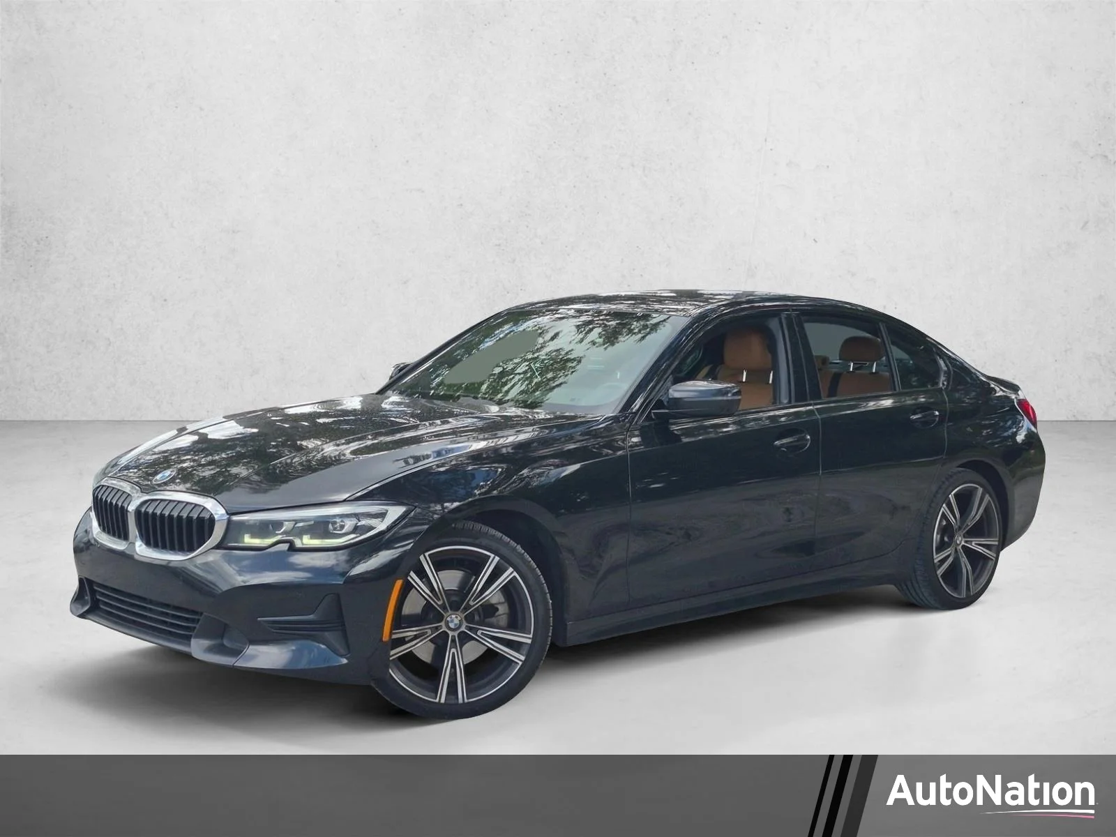 Used 2022 Black Sapphire Metallic BMW 330i image 1