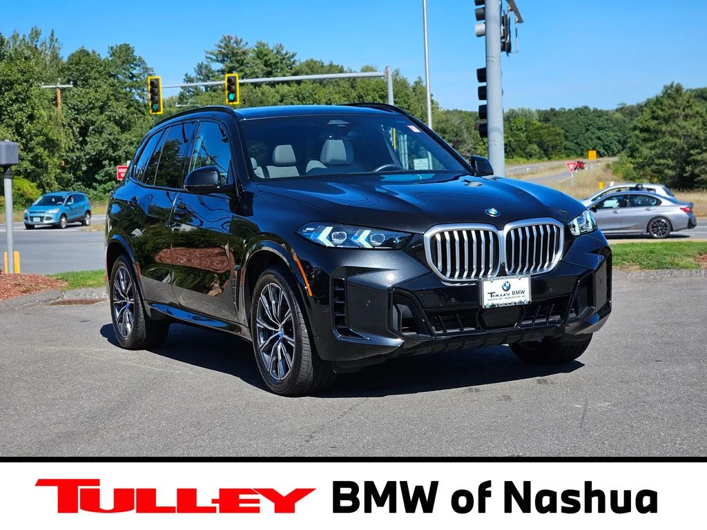 Used 2026 Black Sapphire Metallic BMW xDrive40i image 1